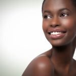 Cheek implants for addressing facial structure or volume loss