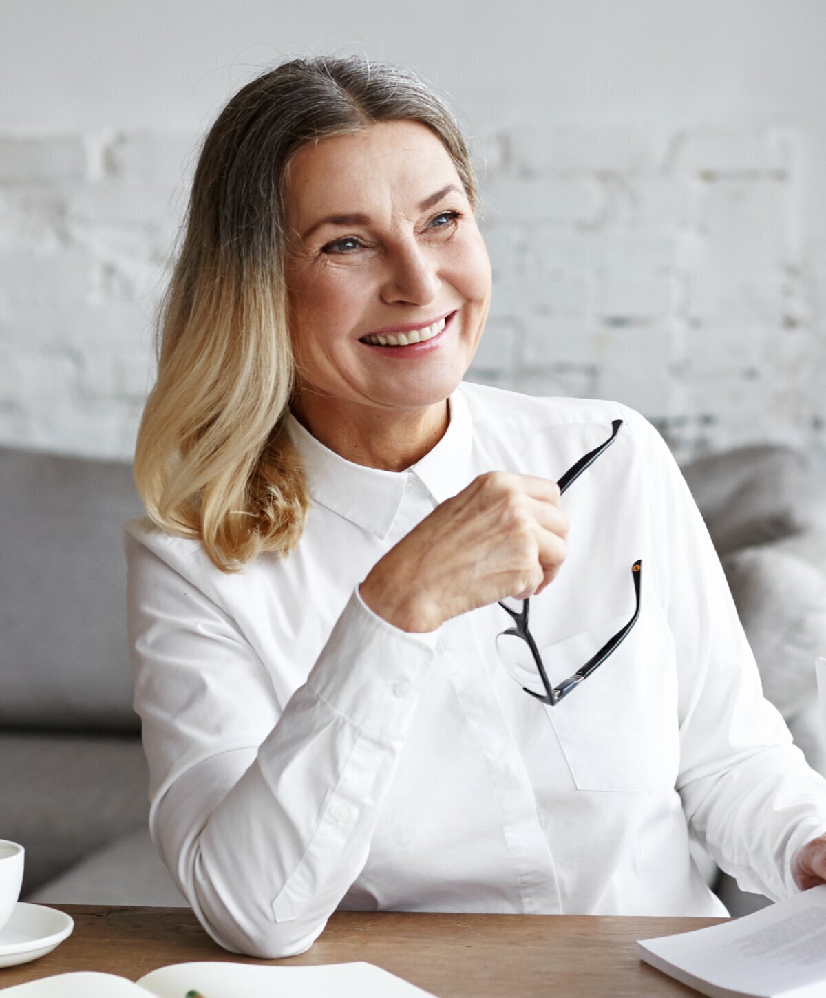 Dallas neck lift patient dressed in all white