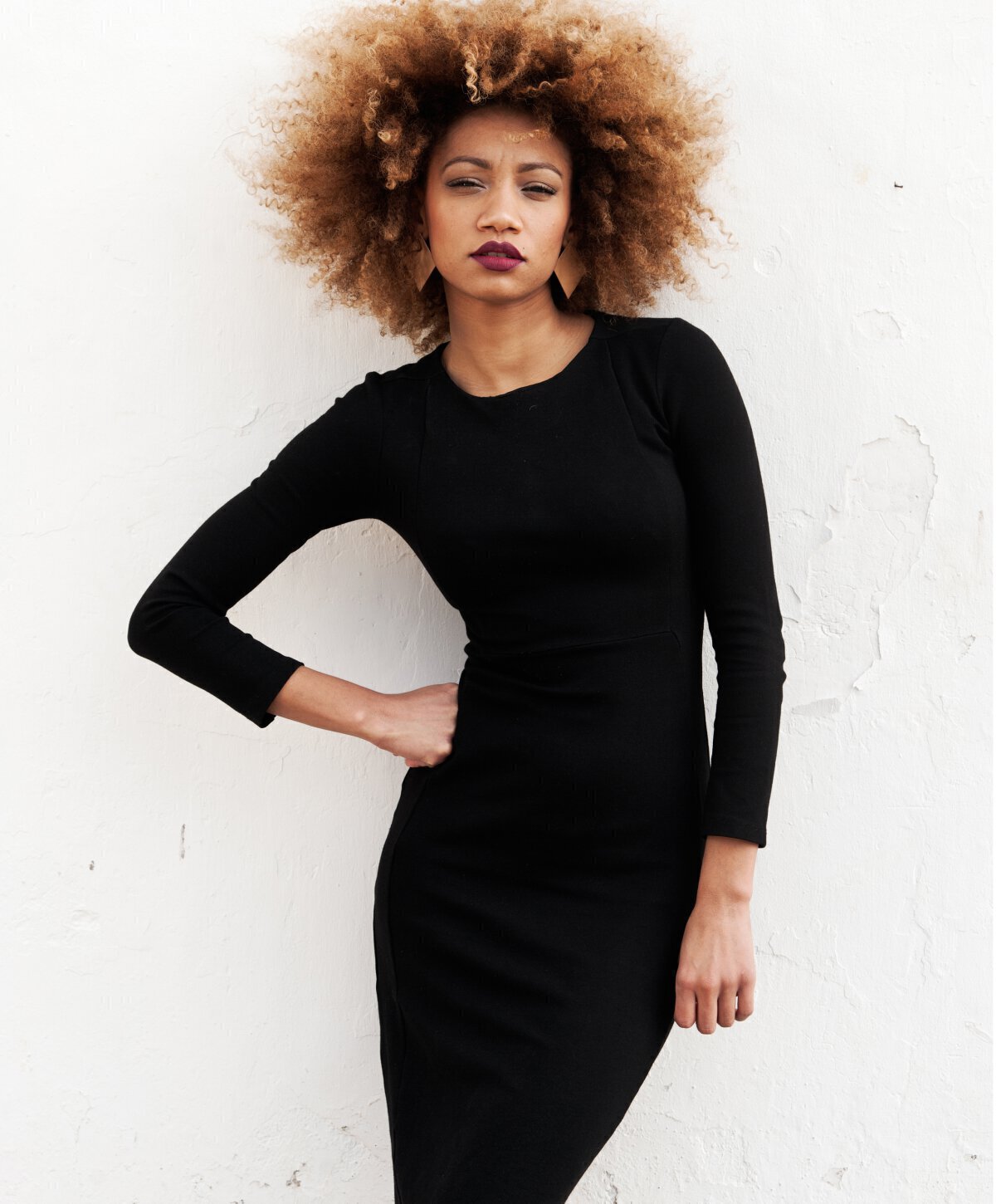dallas labiaplasty model in black dress